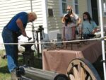 a man doing blacksmithing